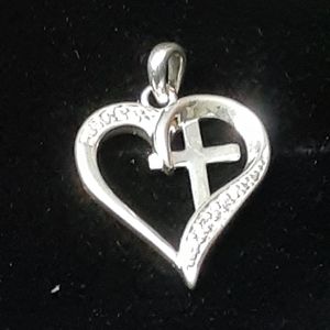 Sterling Silver Heart Pendent With Cross Inside of Heart.
